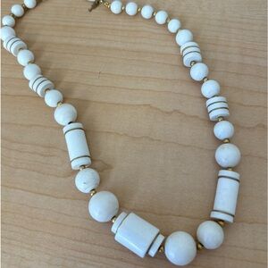 Trifari white beaded lucite necklace/ gold tone/threaded barrel clasp